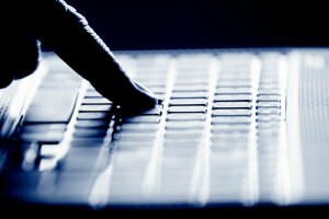 Hacker's Single Finger on Keyboard